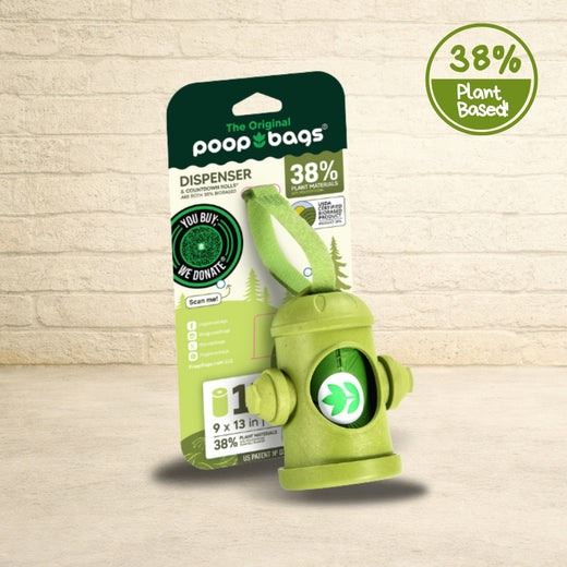 The Original Poop Bags green fire hydrant-shaped dispenser with 38 percent plant-based countdown roll and retail card packaging.