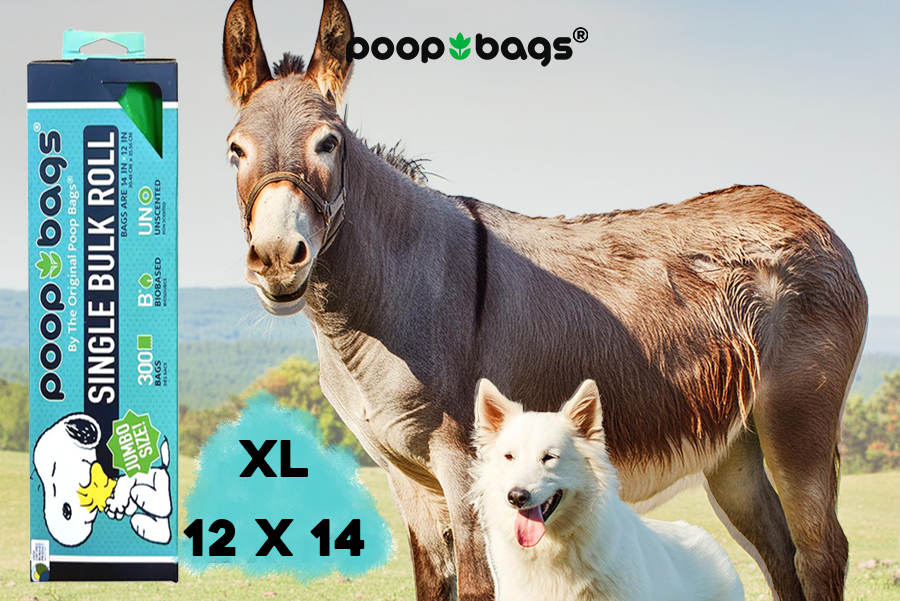 Extra large 12 by 14 poop bags bulk roll beside a donkey and white dog in a field.