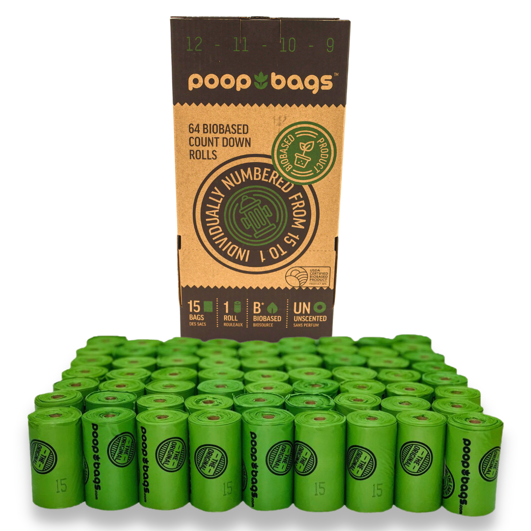 Wholesale countertop SuperBox display with 64 green biobased Countdown Rolls of dog poop bags.