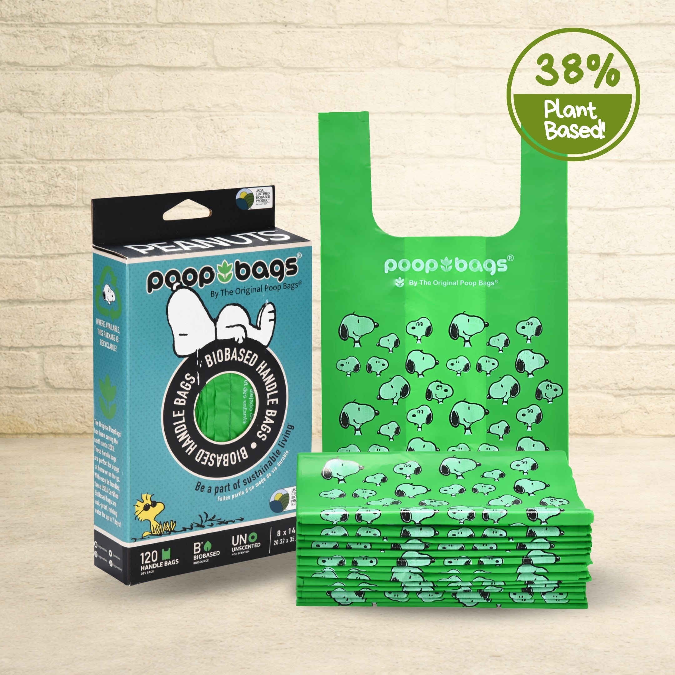 The Original Poop Bags Peanuts Snoopy edition biobased handle bags in green with 120 unscented bags and blue retail packaging.
