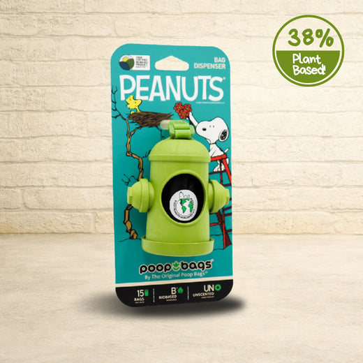 Peanuts Poop Bags green fire hydrant dispenser with Snoopy design on blue retail card including 15 biobased unscented bags.