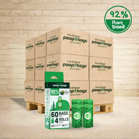 The Original Poop Bags 92% plant-based wholesale pallet with 60-count 4-roll retail box and green refill rolls.