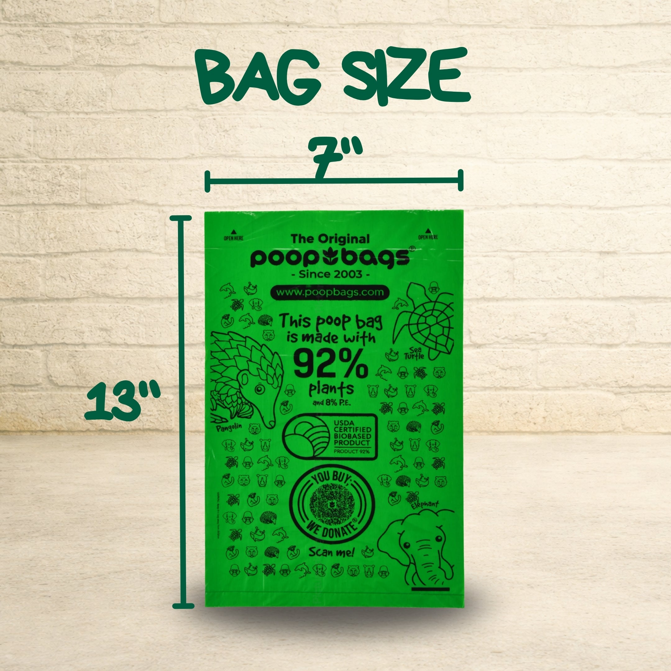 The Original Poop Bags 92 percent plant-based green bag measuring 7 by 13 inches with USDA biobased certification and animal illustrations.