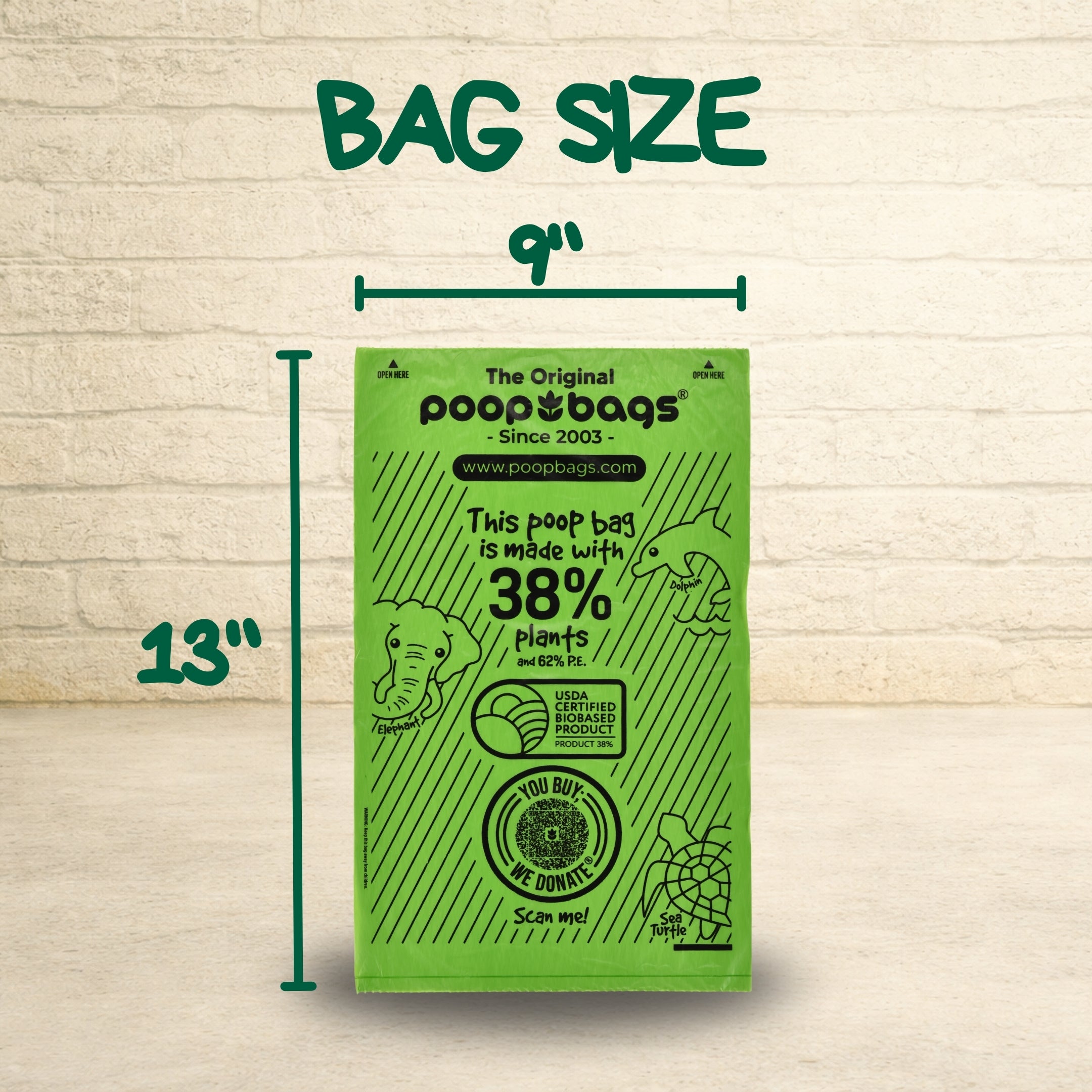 The Original Poop Bags green plant-based bag measuring 9 by 13 inches with USDA biobased certification and You Buy We Donate logo.