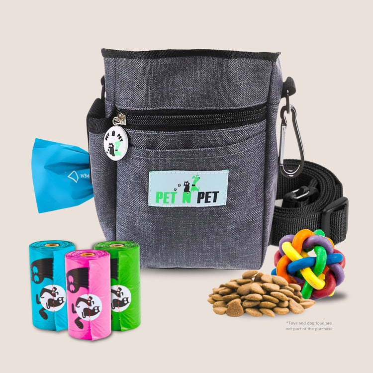 Dog treat pouch in gray with poop bag rolls, colorful toy, dog treats, and waste bag dispenser for complete pet training supplies