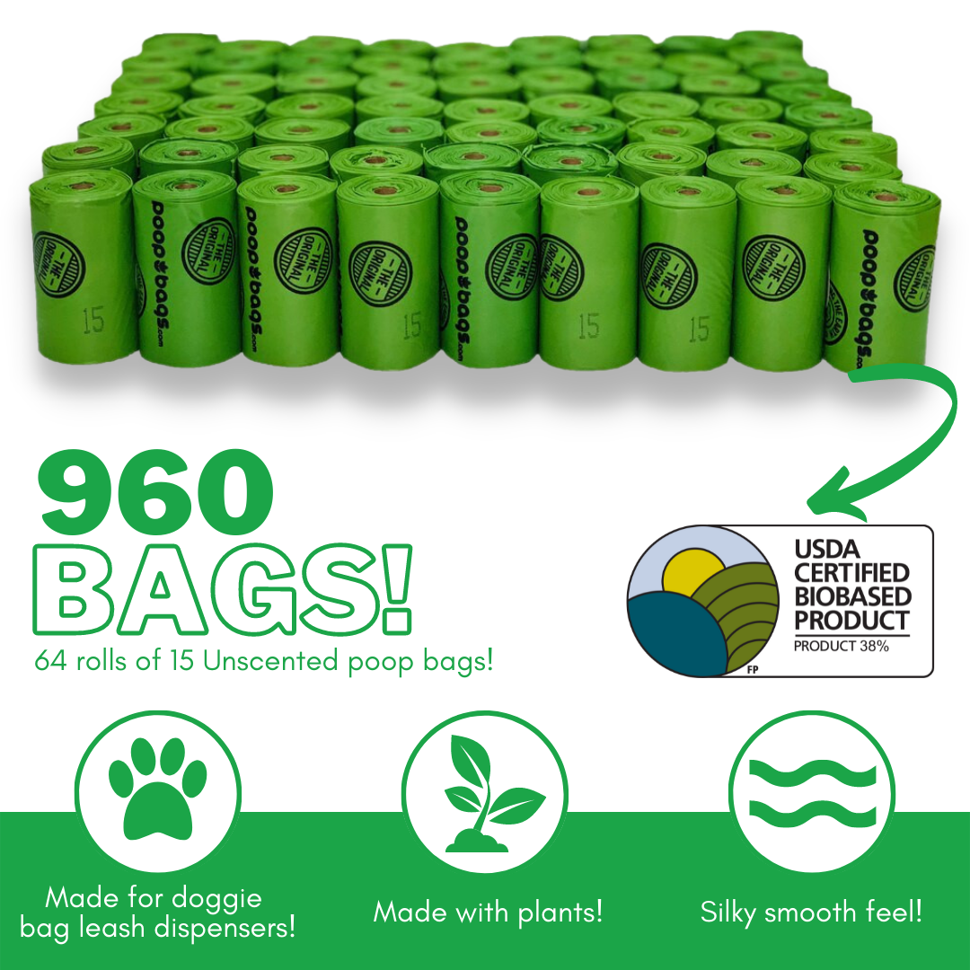 Sixty-four green wholesale poop bag rolls totaling 960 unscented USDA biobased bags for retail display.