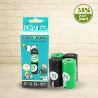 Peanuts Snoopy-themed eco friendly dog poop bags box beside four green and black plant-based refill rolls, unscented.