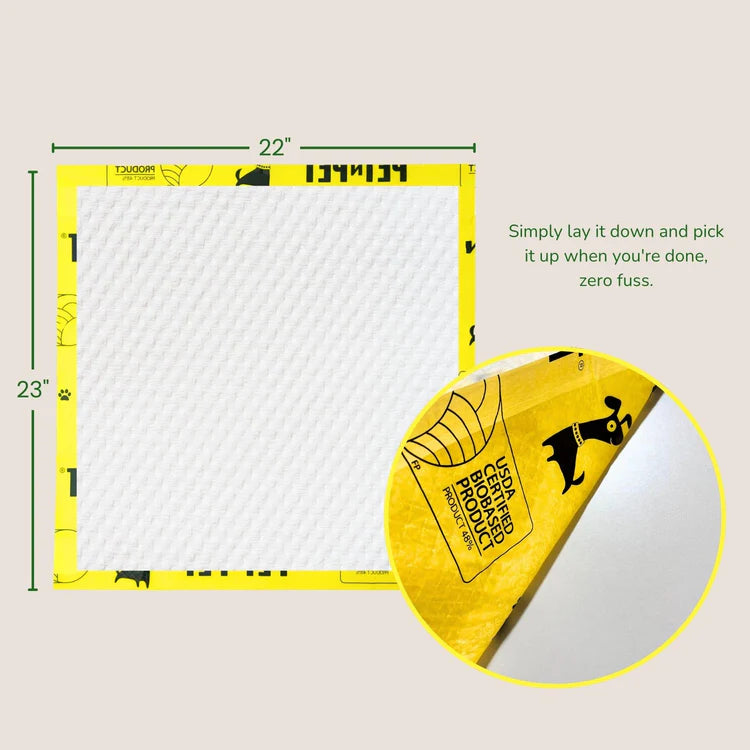Unscented dog pee pads in 22x23 inch size with yellow border showing absorbent surface and easy cleanup messaging for pet owners