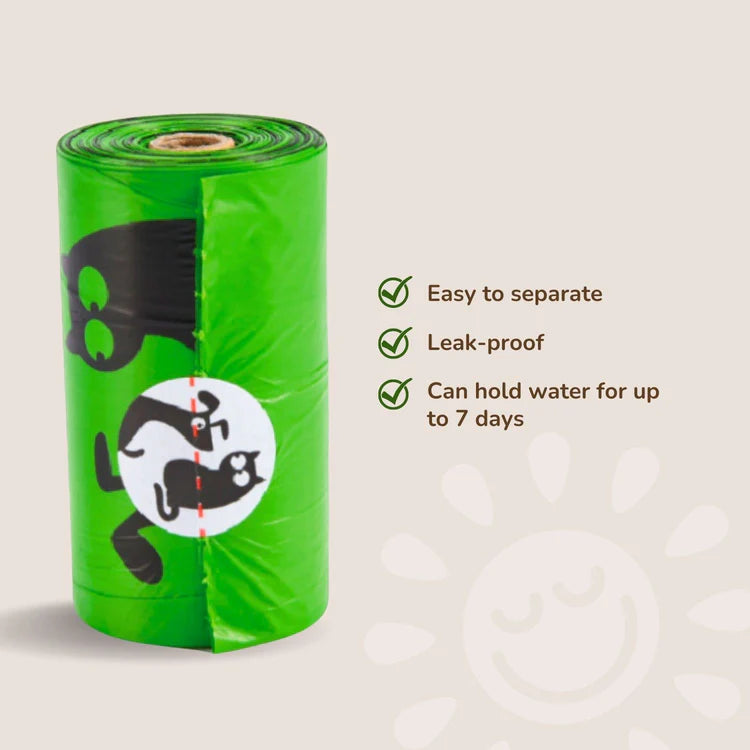 Pet n Pet eco-friendly dog waste bag roll in bright green with cartoon cat graphics highlighting easy-to-separate, leak-proof, and 7-day water-holding features.