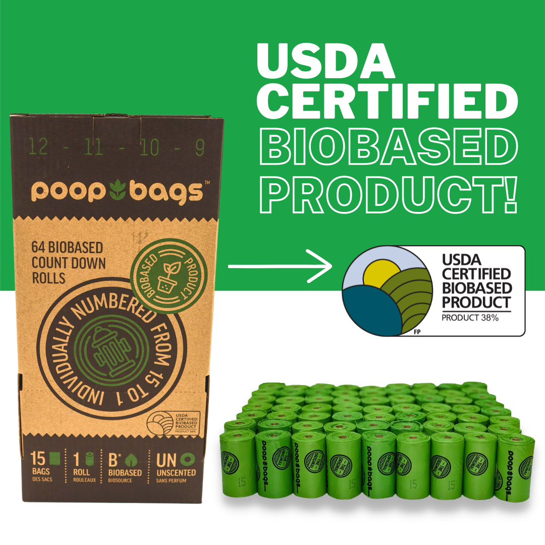 SuperBox countertop display holding 64 green biobased Countdown Rolls of dog poop bags.