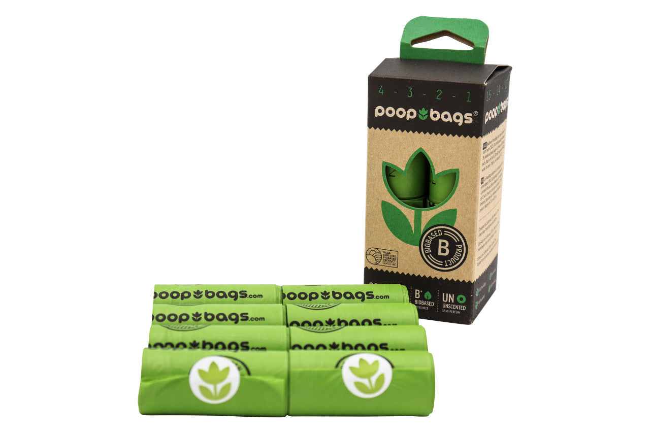 Green Countdown Rolls unscented leash poop bags beside kraft box with USDA biobased seal.