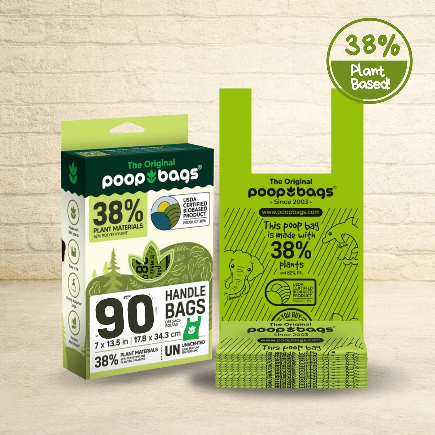 The Original Poop Bags 90-count box beside a stack of green 38% plant-based dog poop bags with handles, unscented.